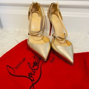 Christian Louboutin gold heels